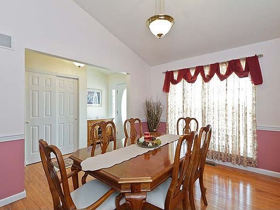 Vaulted formal dining area.