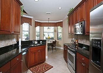 Granite, Cherry, Stainless Kitchen