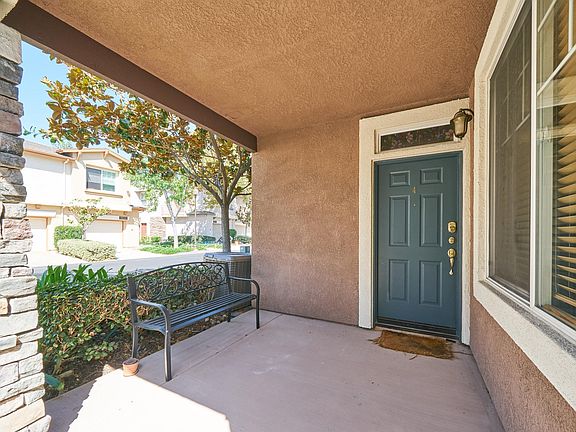Covered front entrance with bench