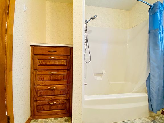 Master bathroom with build in storage!