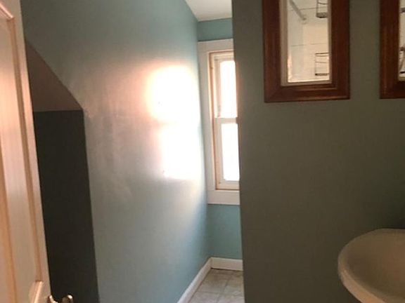 Bathroom, shower only, no tub.