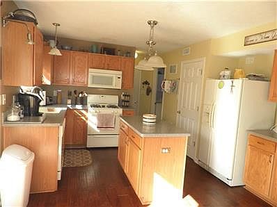 Kitchen with updated solid surface countertops