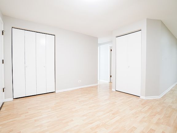 View of dining room from kitchen. Coat closet (left) is 5' X 1.75'. Pantry (right) is 3' X 1'.
