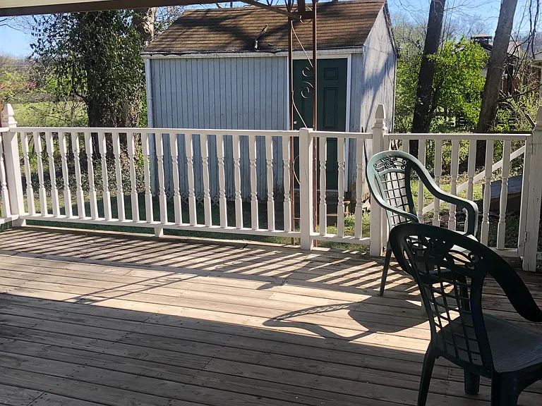 Storage shed included