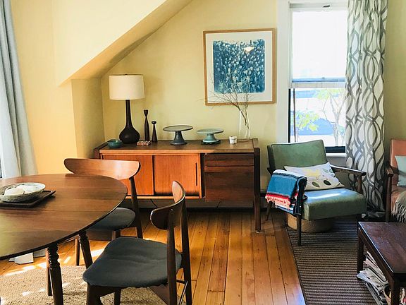 Thisis another section of the livingroom where the tenant also created a dining area in the bay window.