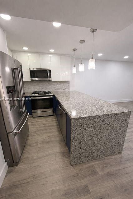 1st image of 1555 W 44th Pl APT 247