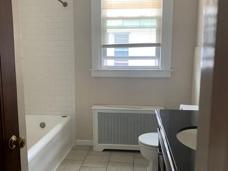 Bathroom with tile floor.