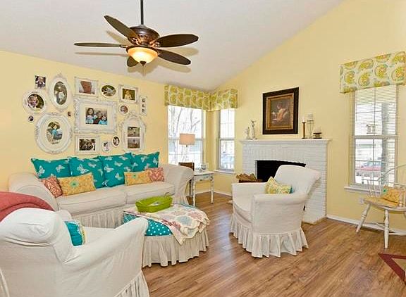 Newer laminate flooring installed in March 2016. Wood burning fireplace, massive vault, open floor p