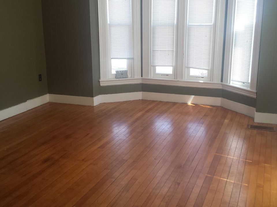 Large livingroom with hardwood flooring