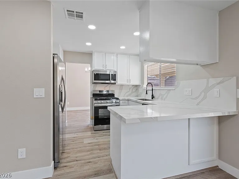 7627 Kalmalii Ave — Photo 13
