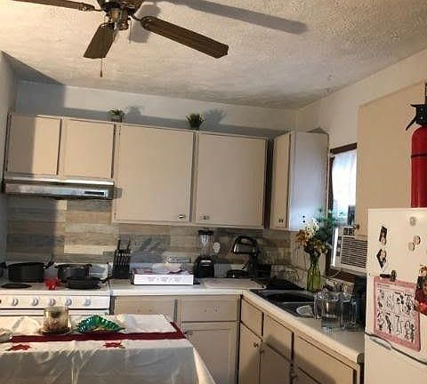 Kitchen with new stove fan