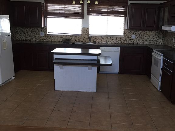 Kitchen has island
