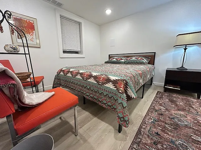 queen size bed with new mattress and closet with ample storage
