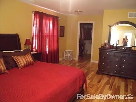 Master bedroom
						:
						Master bedroom walk in closet, master bath, and door leading to backyard.