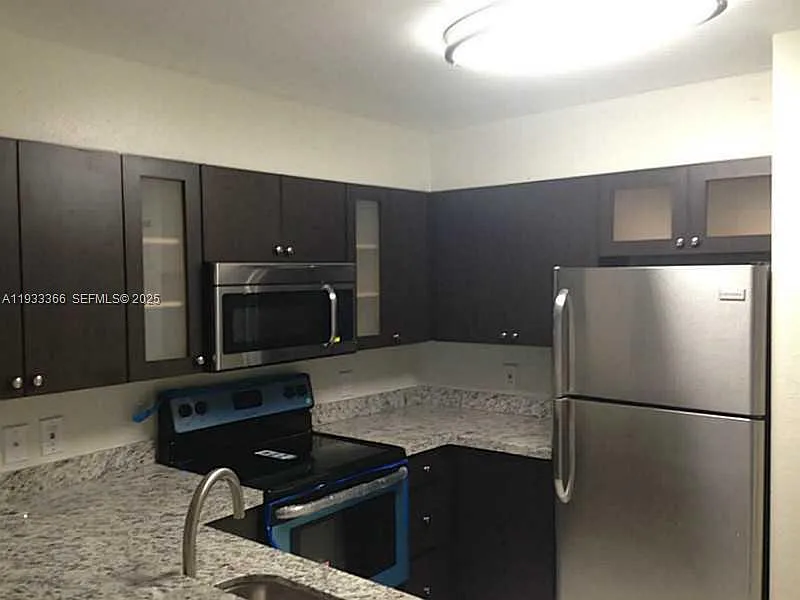 Building Photo - 4350 NW 107th Ave #102