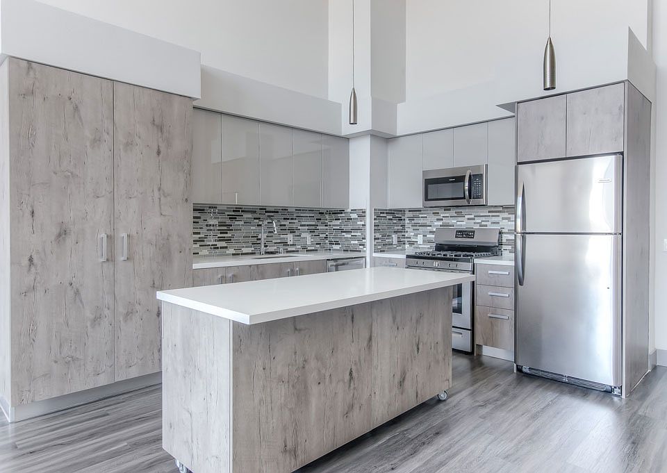Beautiful chef's dream kitchen! Rolling islands...