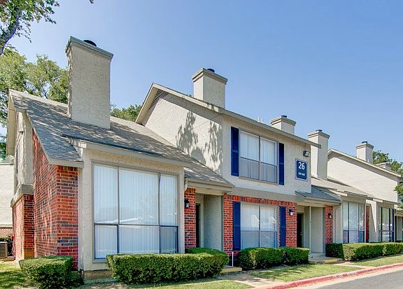 Beautiful exterior view of Three60 North Apartments with updated architectural design and mature landscaping.