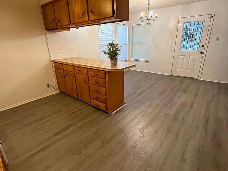 Kitchen with view towards back of house.