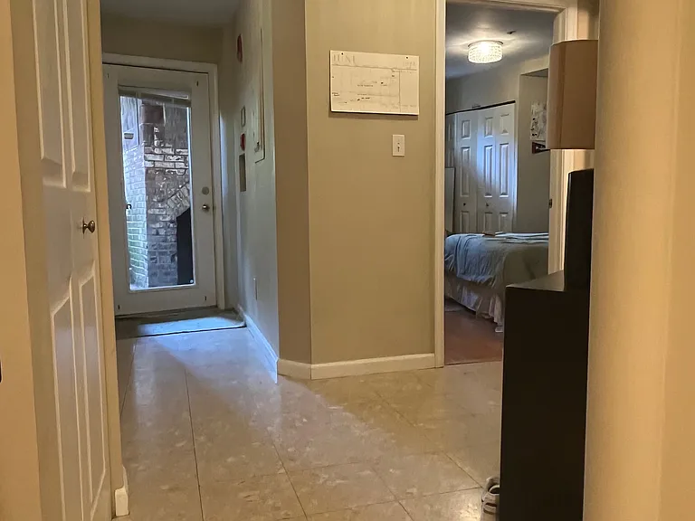 Entry foyer looking out door