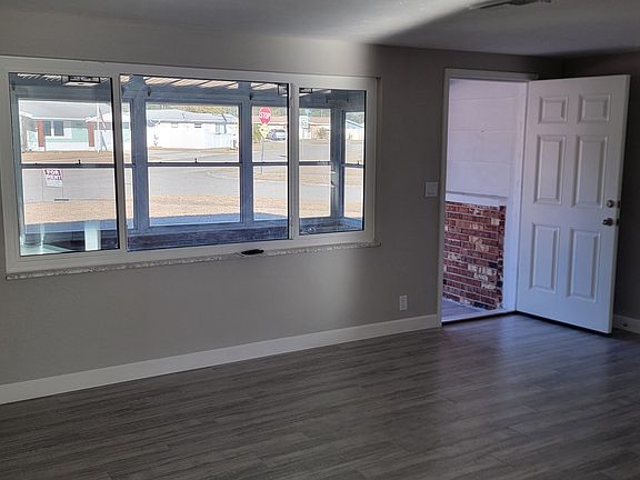 View from kitchen/dining area to living room and front porch