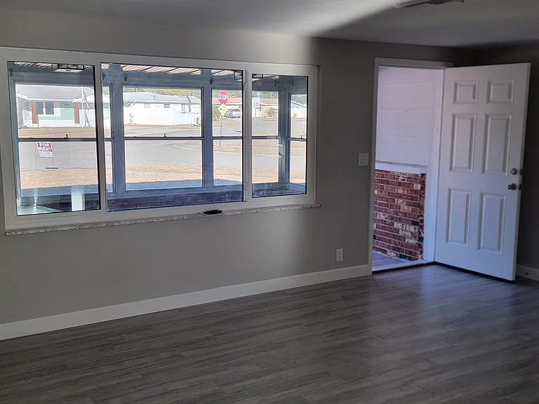 View from kitchen/dining area to living room and front porch