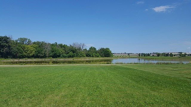 Premier pond setting!  "Imagine... this could be YOUR new home site!"
