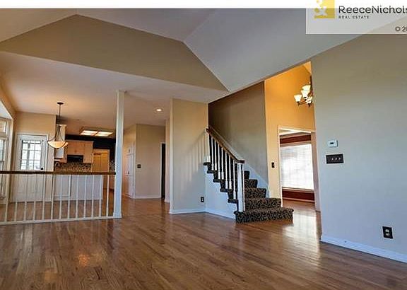 Family room opens to breakfast area, kitchen, foyer, dining room and living room