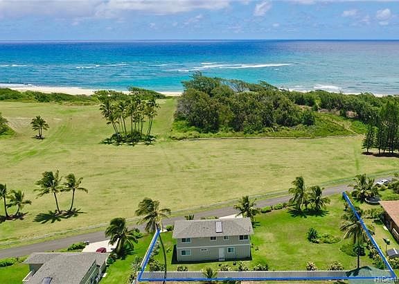 This exquisitely furnished 5bd/3ba home on over 17,504 sq ft of land is adjacent to an oceanfront 114 acre golf course and a mile long secluded white sandy beach!