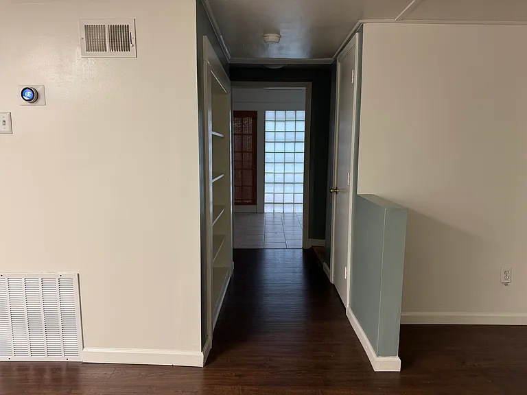 Living room looking into kitchen.