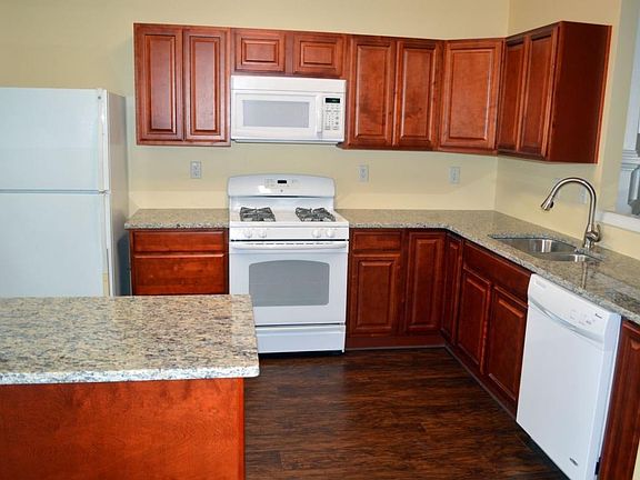 Remodeled kitchen with new cabinets and granite countertops