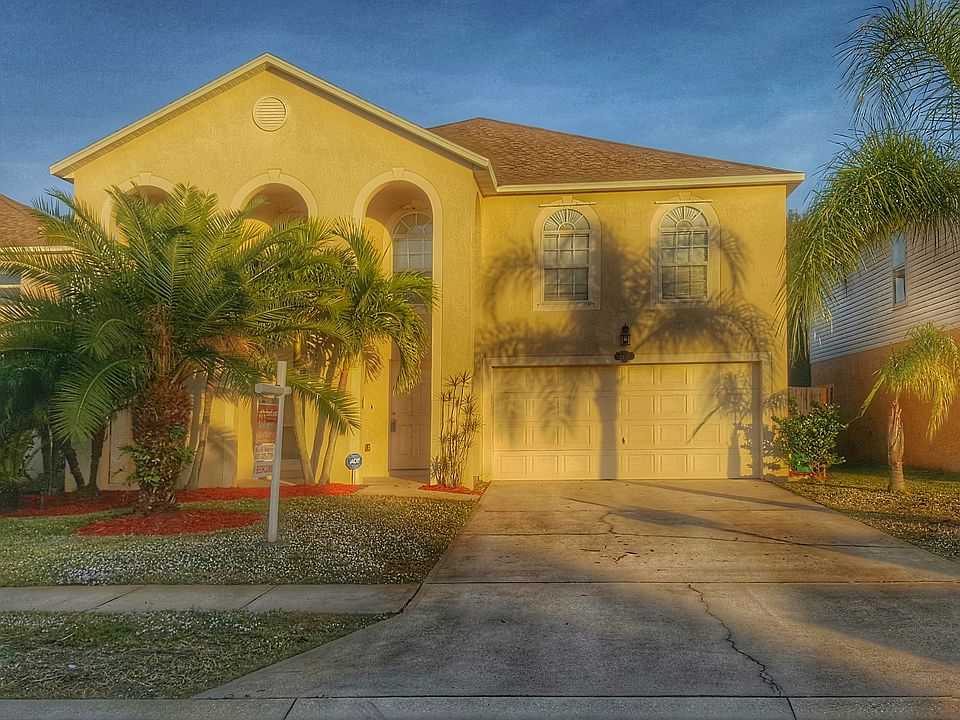 Sunset Painted Front of Home