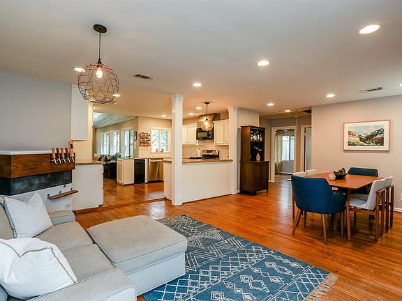 Upon entry into the home, you'll find a large open floor plan from front to back. Recessed lights, hardwood floors, and lots of storage.