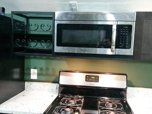 stainless appliances, including dishwasher, gas range, micro