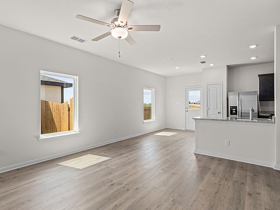 The family room sits right off of the kitchen and dining room.