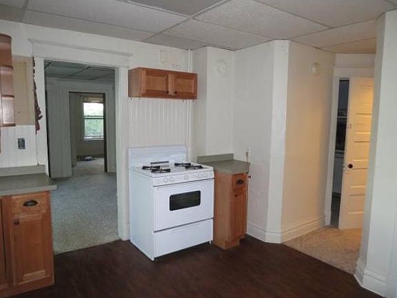 Kitchen looking into living room and front