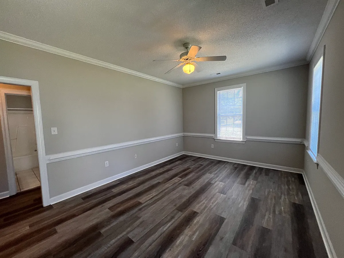 LIVING ROOM WITH NEW LVP FLOORING - 3318 Whitlock Dr N #A