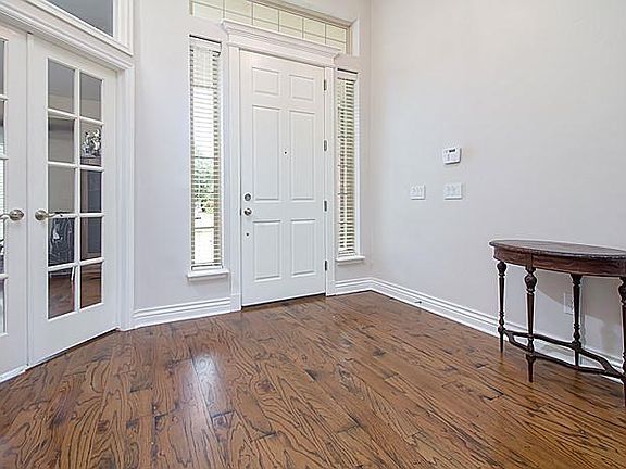 lovely wood floors right off the front door. office is to the left