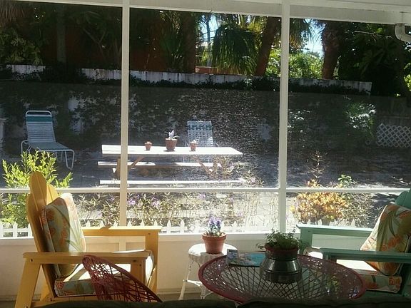 Back screened in Patio and back yard fire pit