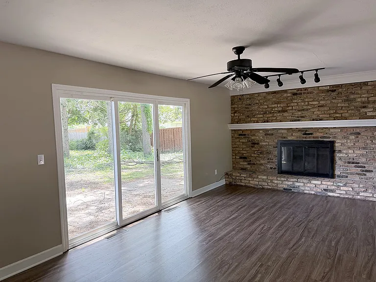 Family Room with sliding glass door to backyard patio area