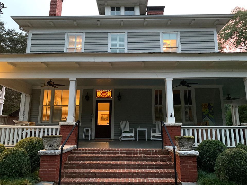 Walk up the front steps to the large front porch.