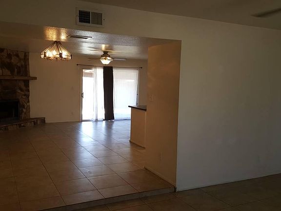 Sunken Living Room, Dining, Family Room with Fireplace