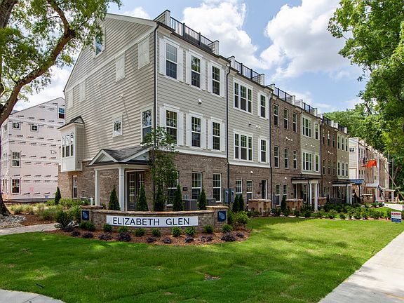 Broxton Exterior 74 features James Hardie TM siding, brick, covered front door, terrace and 2 car r