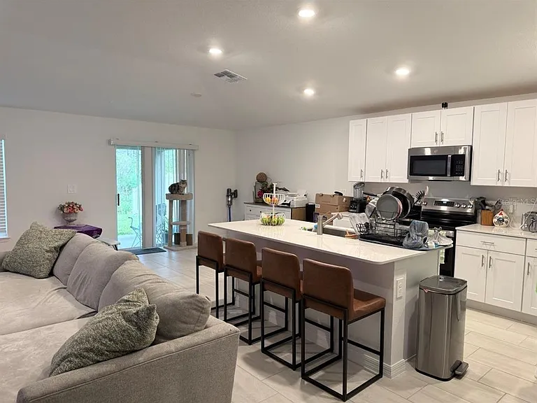 1629 Tropical Oasis Ave — Photo 10