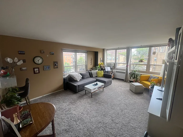 Large space with a built in TV stand and storage