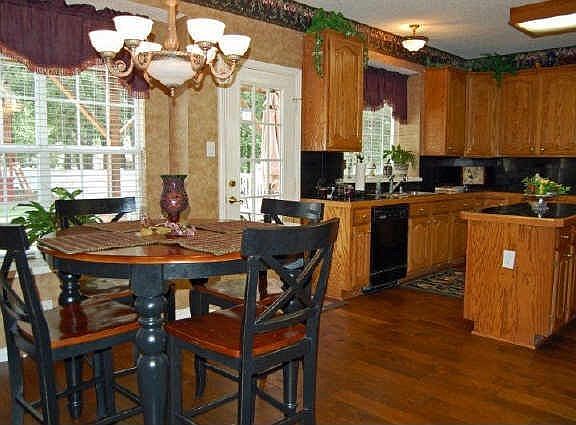 In this picture you can see the breakfast nook and the Kitchen.
