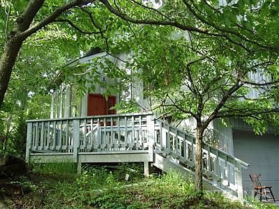 Front Entrance nestled in the trees