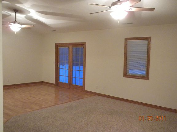 Dining room and living room with walk-out to backyard