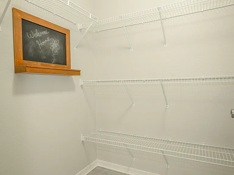 Spacious walk-in closet at Amberleigh Ridge