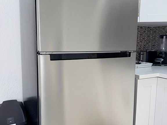 Full frig and freezer