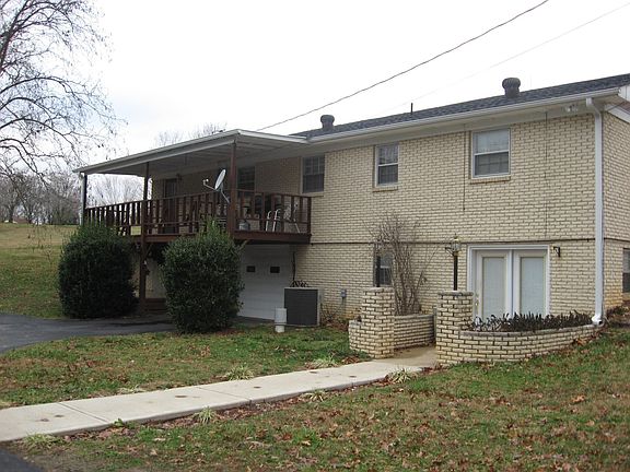 Spacious deck overlooking wooded scenery